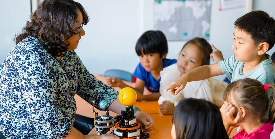 Ms. Tafoya and students during STEM class