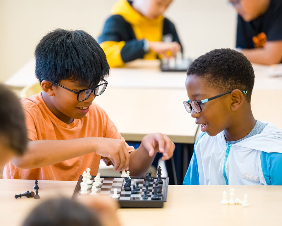 Students play chess