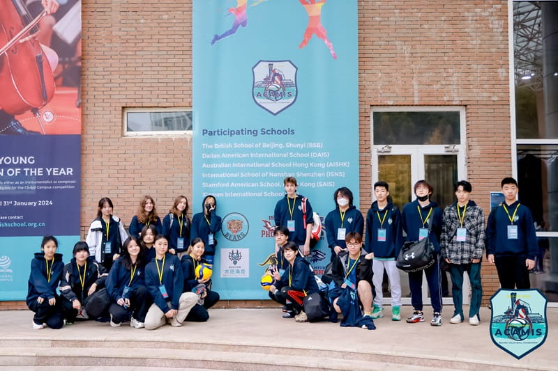 DAIS volleyball team group picture before the tournament