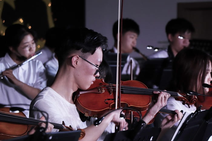 Peter playing the violin