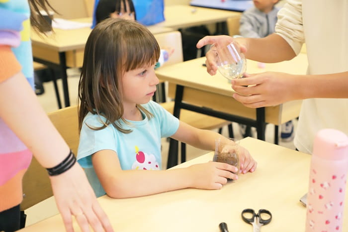 A girl planting grass