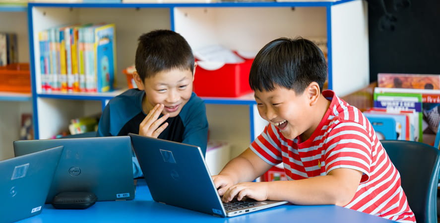 Kids working on computer