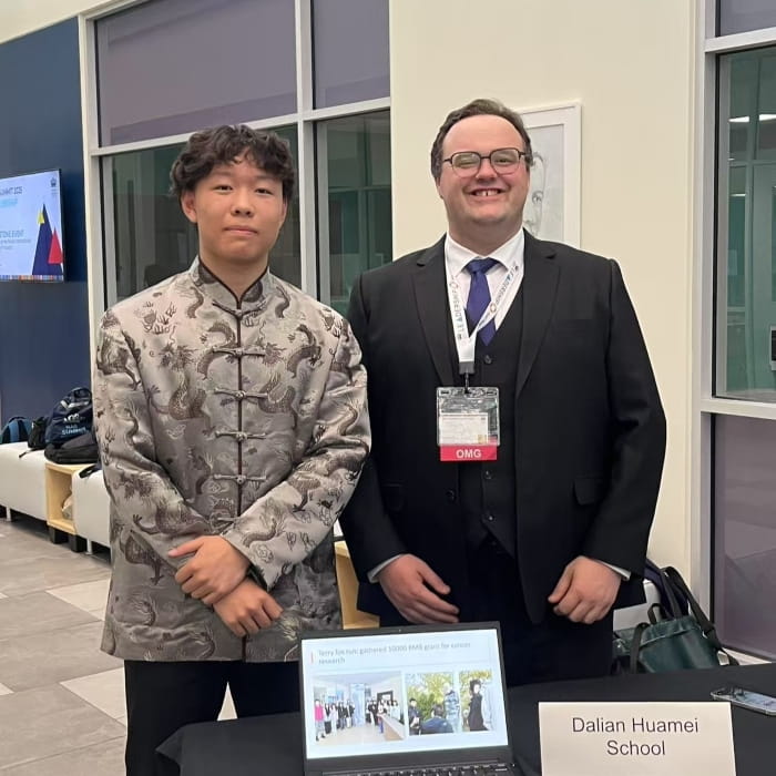 Michael Ma and Mr. Singleton presenting DAIS/DHS project