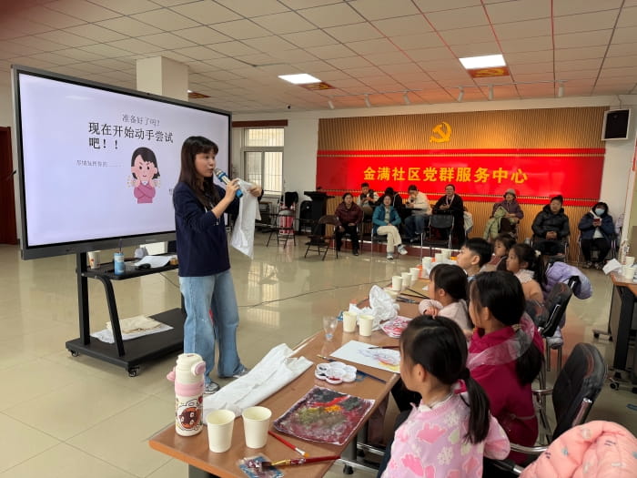 Yian leading an art class